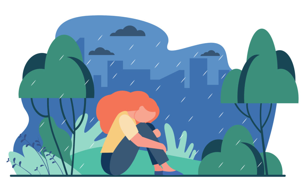 Depressão Menina infeliz na chuva. Mulher triste sentada no parque chuvoso ao ar livre. Depressão, estresse, solidão.